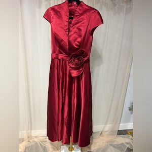 Elegant Red Satin Dress with Floral Accent